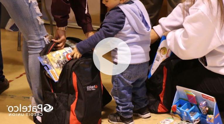 Patelco team members distribute backpacks to families affected by the Camp Fire in Paradise, California.
